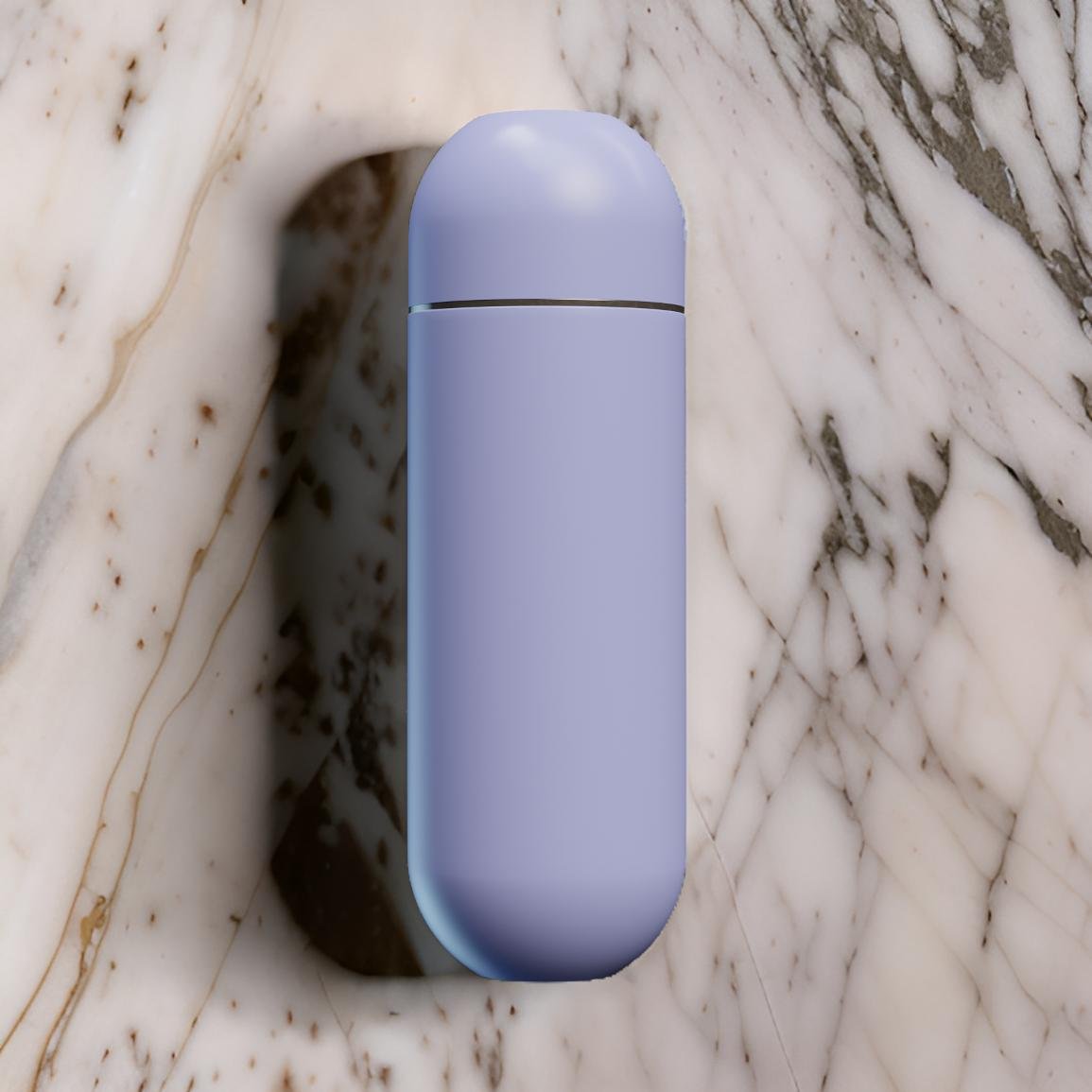 Closed purple portable bidet resting on a marble surface